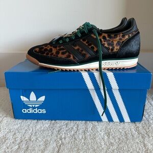 Women’s Adidas Calf Hair Black and Leopard Print Sneakers w/Teal Laces. NWT